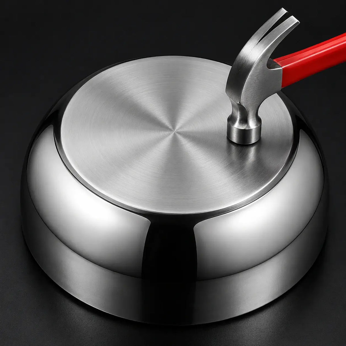 Reinforced flat base of a stainless steel mixing bowl