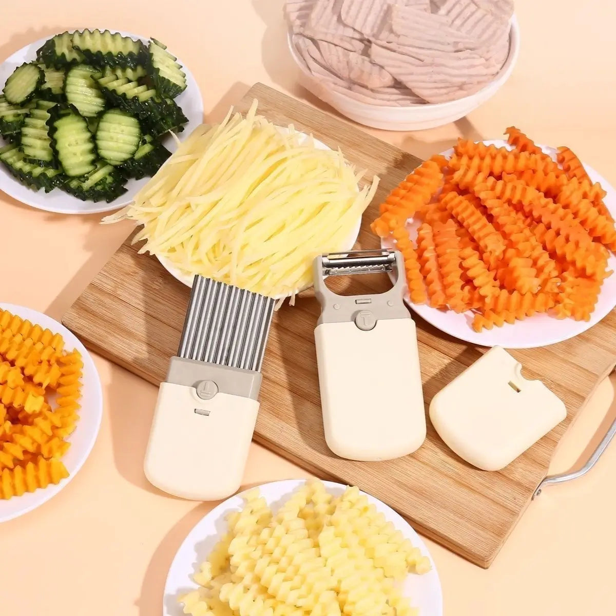 Prepared cucumber, potato and carrot in julienne and crinkle-cut styles
