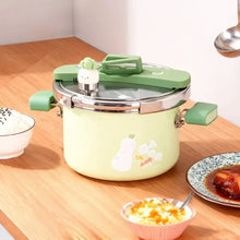 Compact Enamel Pressure Cooker on a dining table