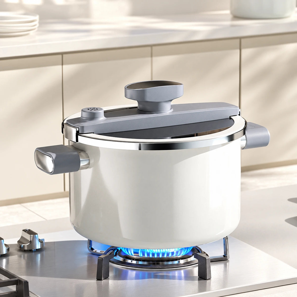 Pearl White enamel cooker with its glass locking lid on a gas stovetop