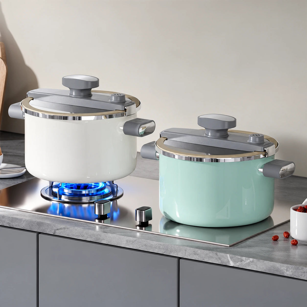 Pearl White cooker on gas and Mint Green cooker on a flat induction surface