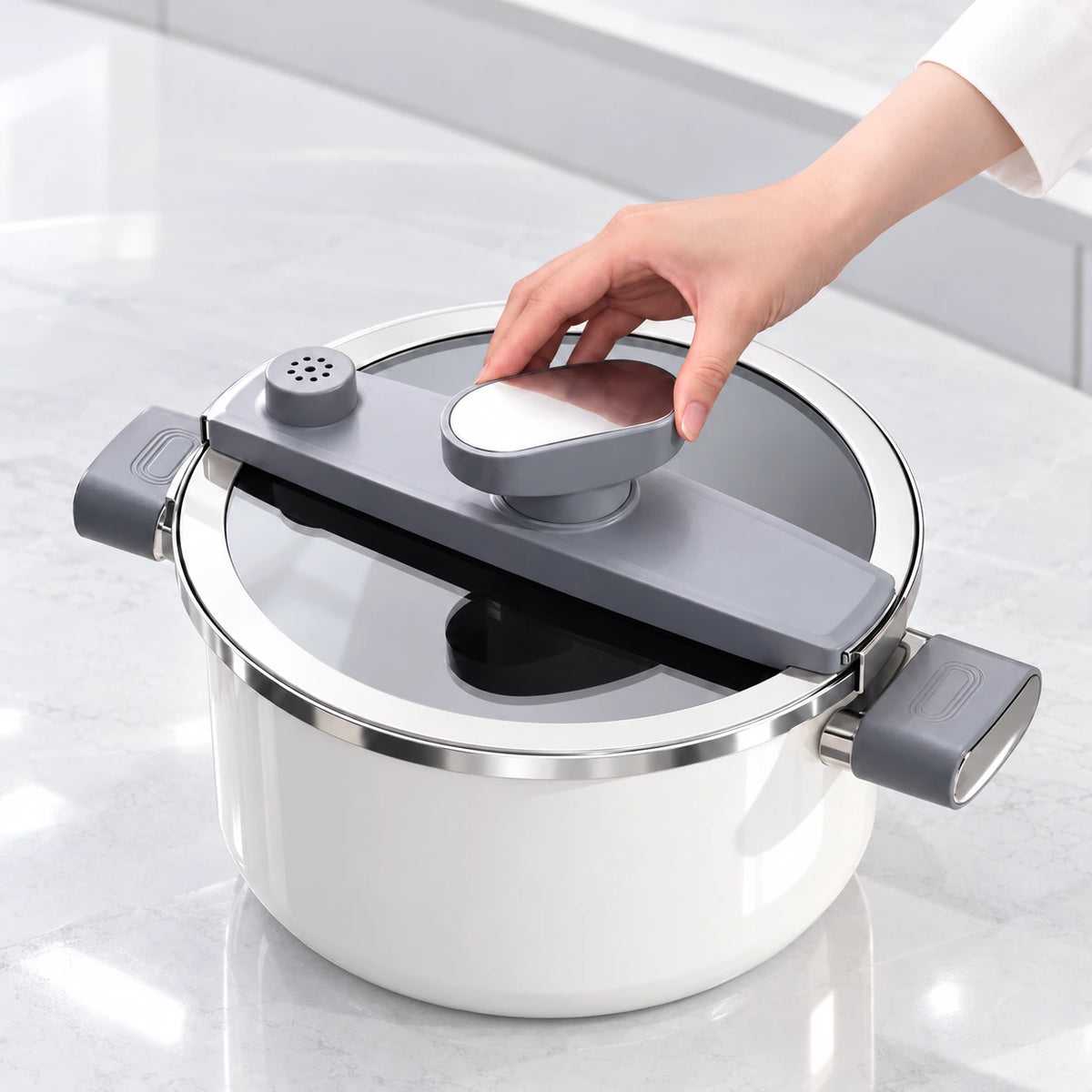 Central twist control and perforated pressure-release valve on the cooker lid