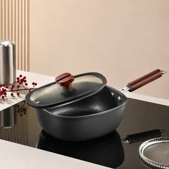 Hero — hammered titanium iron pan and fitted glass lid