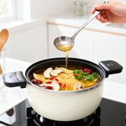 White soup pot ready for serving
