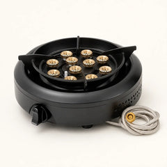 Black multi-flame camping stove with remote fuel hose