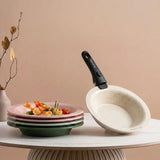 Stack and Serve ceramic pan set in ivory, blush and sage
