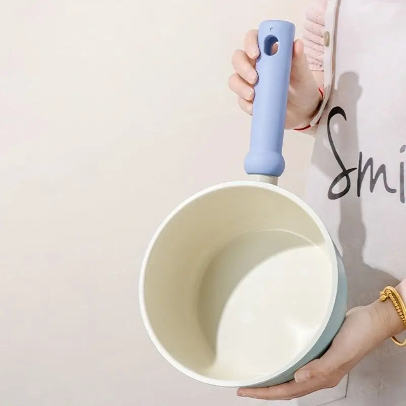 Cream ceramic-coated interior of the Little Blue Ceramic Pot