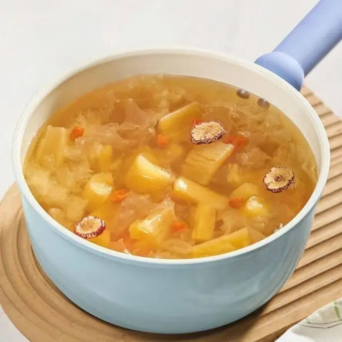 Warm soup served in the Little Blue Ceramic Pot