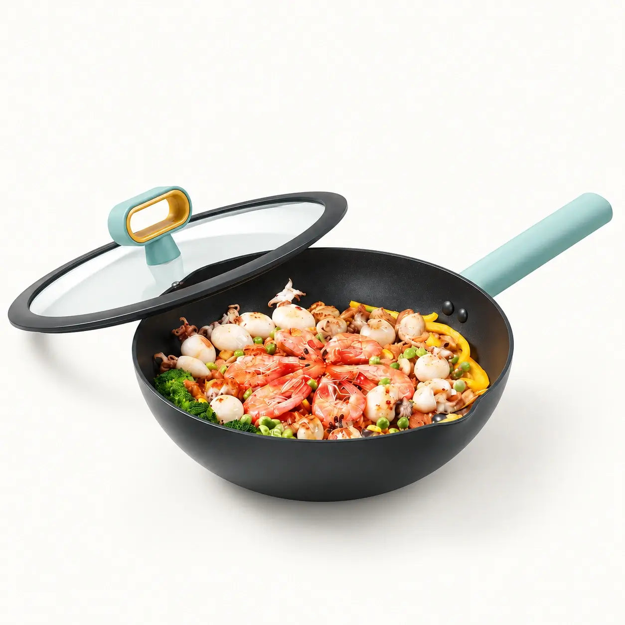 Black stir-fry pan filled with colorful seafood and vegetables, glass lid lifted