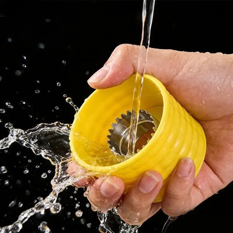 Corn stripper rinsing under running water